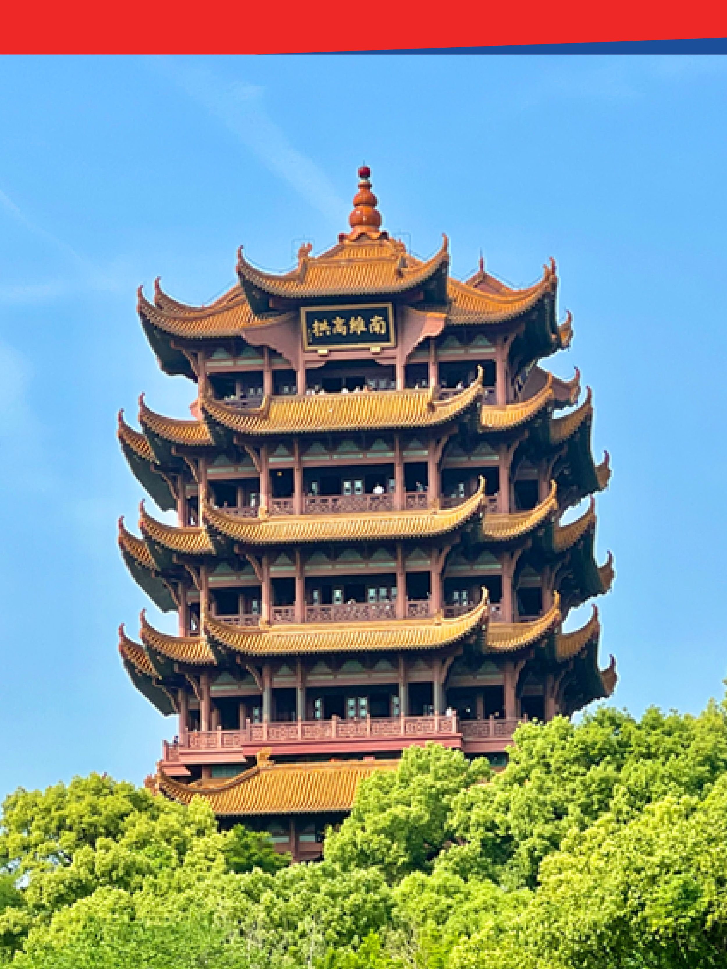 Traditional Chinese pagoda with ornate architecture surrounded by lush gardens